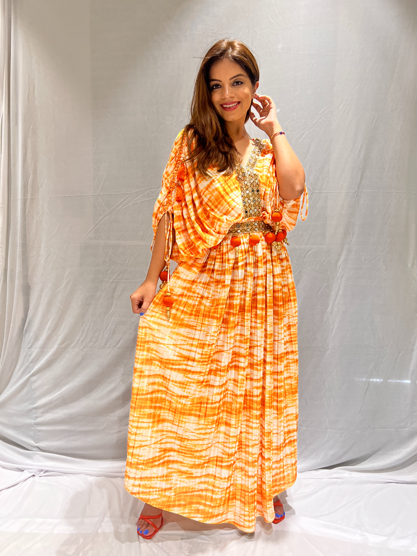 Mirror lace orange and white tie-dye dress – bohemian style with intricate detailing and vibrant colors