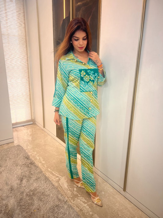 floral co-ord set

peach two-piece outfit

festive wear for women

metallic peach set

women's coordinated sets

stylish floral printed co-ord