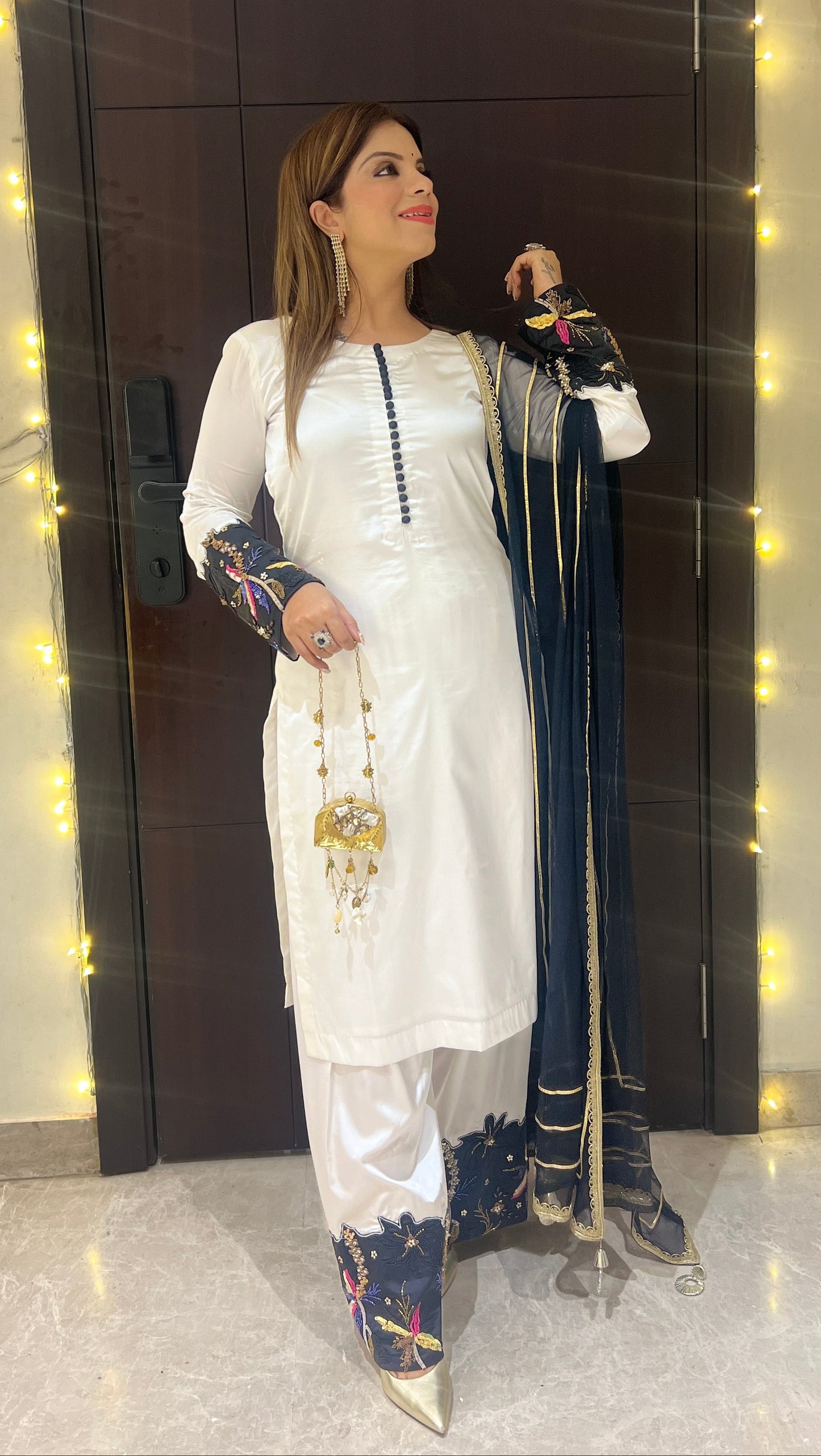 Noor-e-Safa - Classic White Pakistani Suit with Multi Colour Golden Detailing.