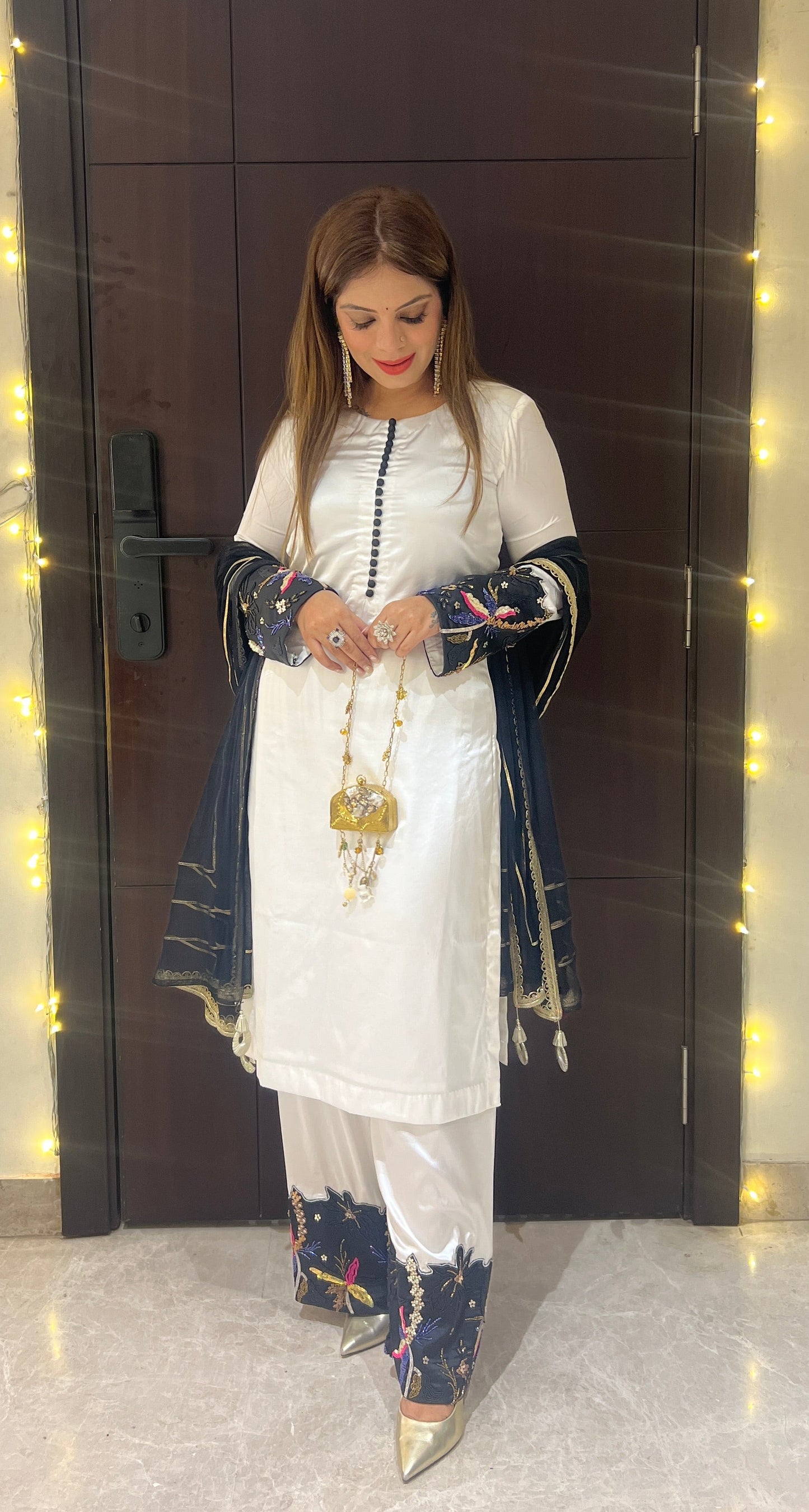Noor-e-Safa - Classic White Pakistani Suit with Multi Colour Golden Detailing.