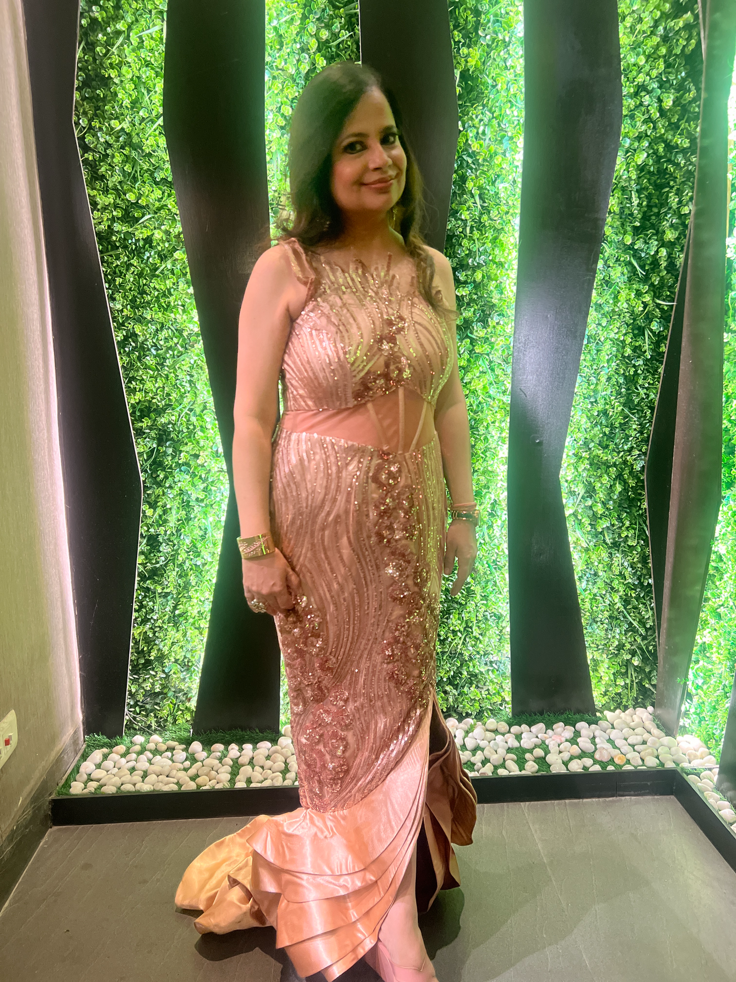 Back view of stylish fish cut gown – floor-length gown with curve-hugging fit