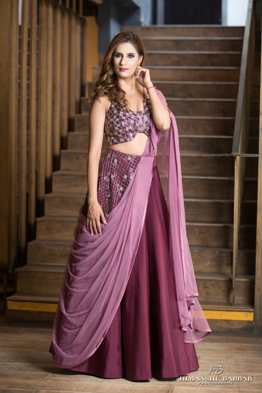 Check hand-embroidered blouse with asymmetrical waist lehenga – modern Indian designer set”
