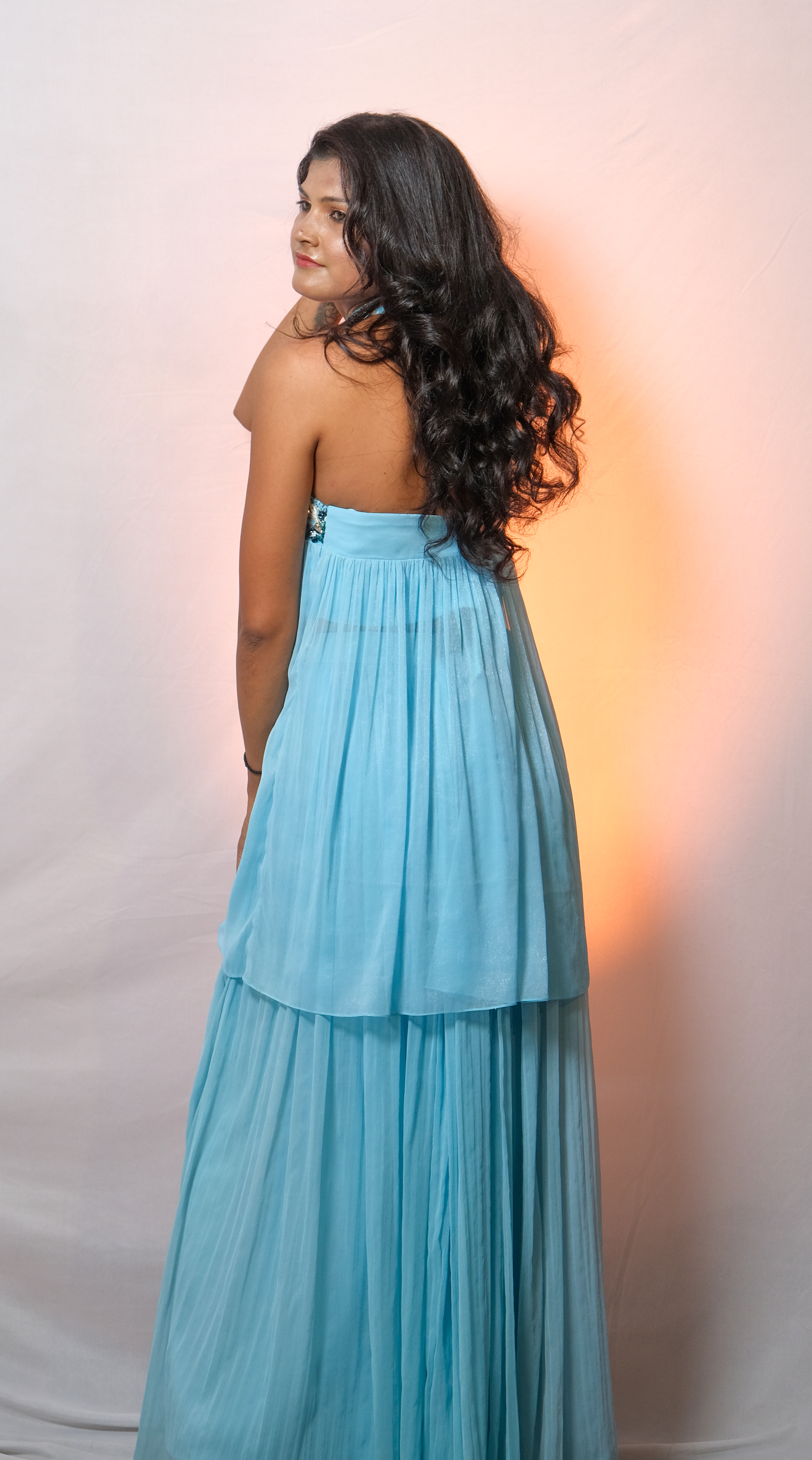 Whimsical sky blue halter ensemble with embroidered floral accents – elegant summer outfit for women