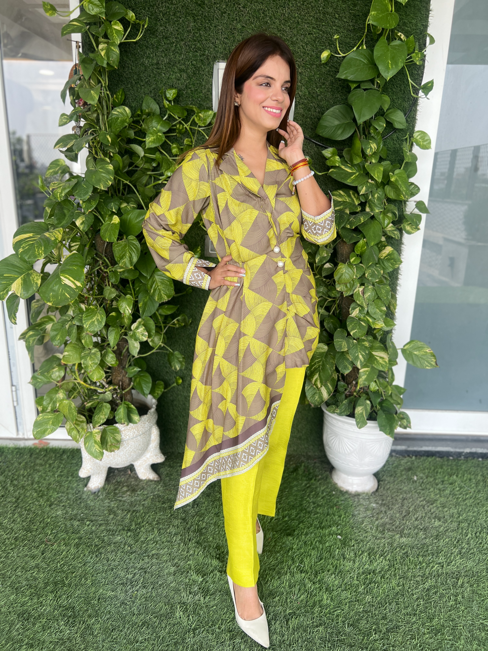 Elegant printed asymmetric coat top with matching pants – modern chic outfit for women