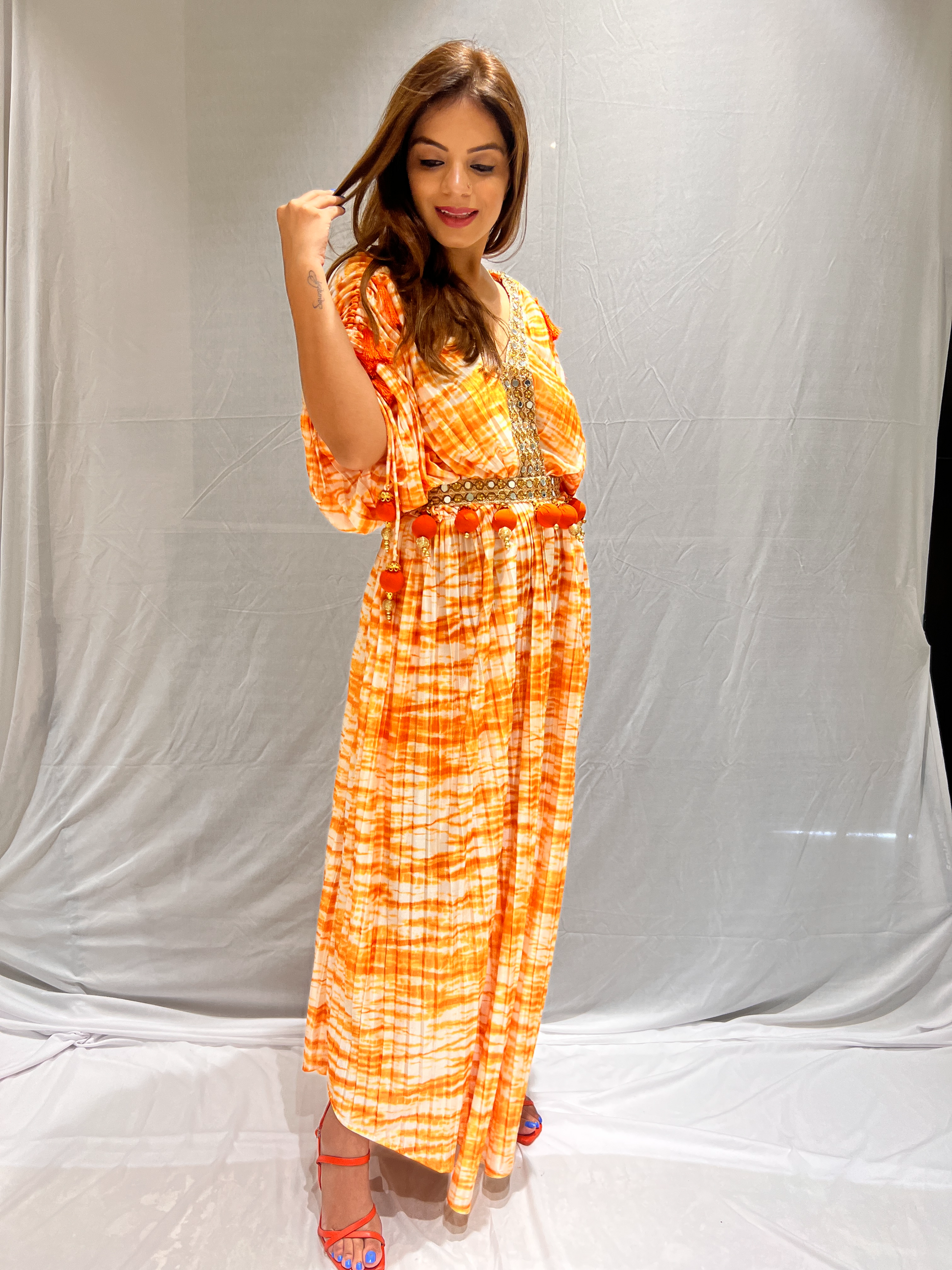 Mirror lace orange and white tie-dye dress – bohemian style with intricate detailing and vibrant colors