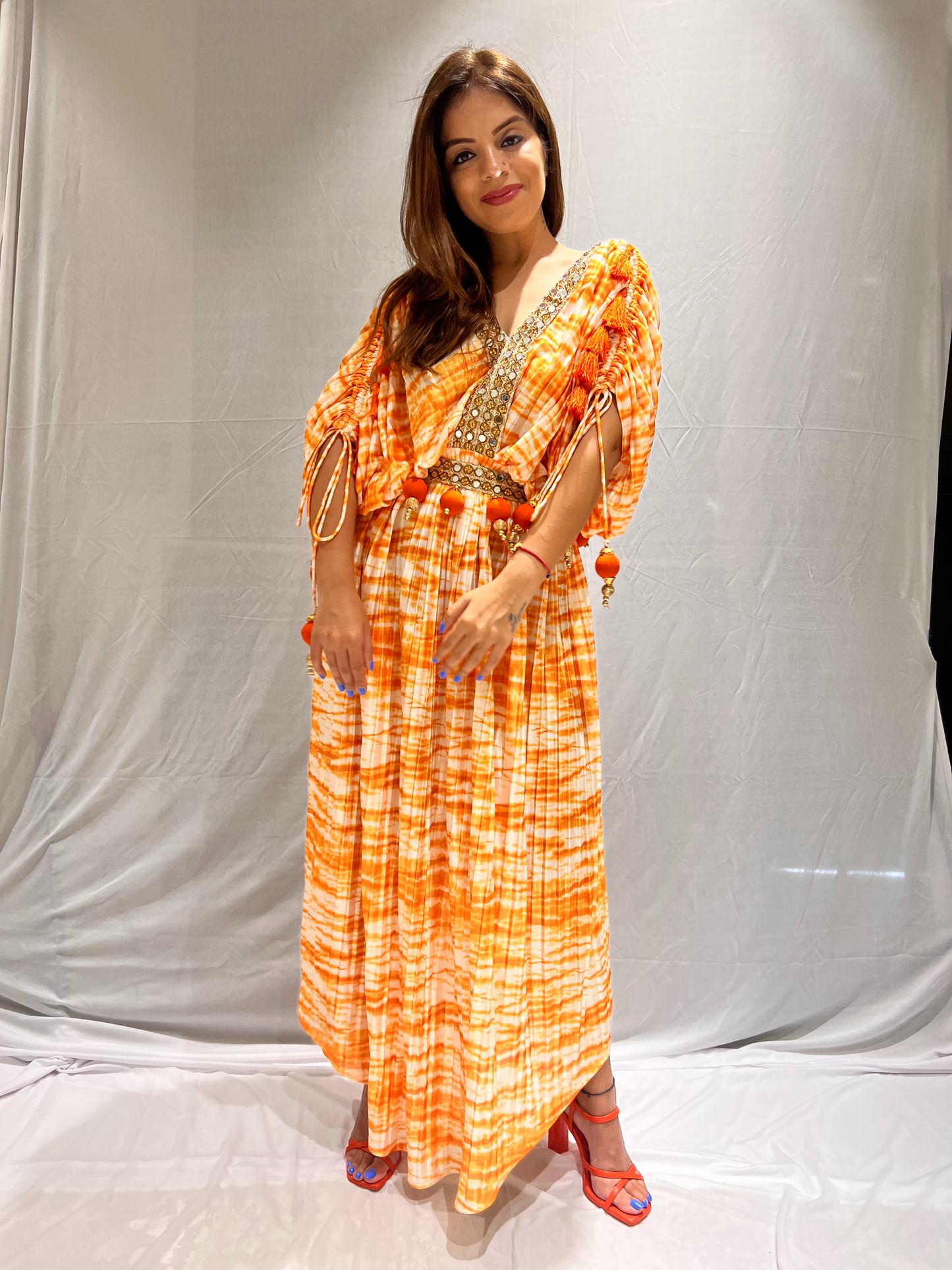Mirror lace orange and white tie-dye dress – bohemian style with intricate detailing and vibrant colors