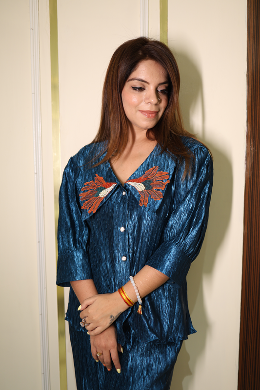 Teal blue co-ord set with vibrant orange embroidery – bold two-piece outfit for women