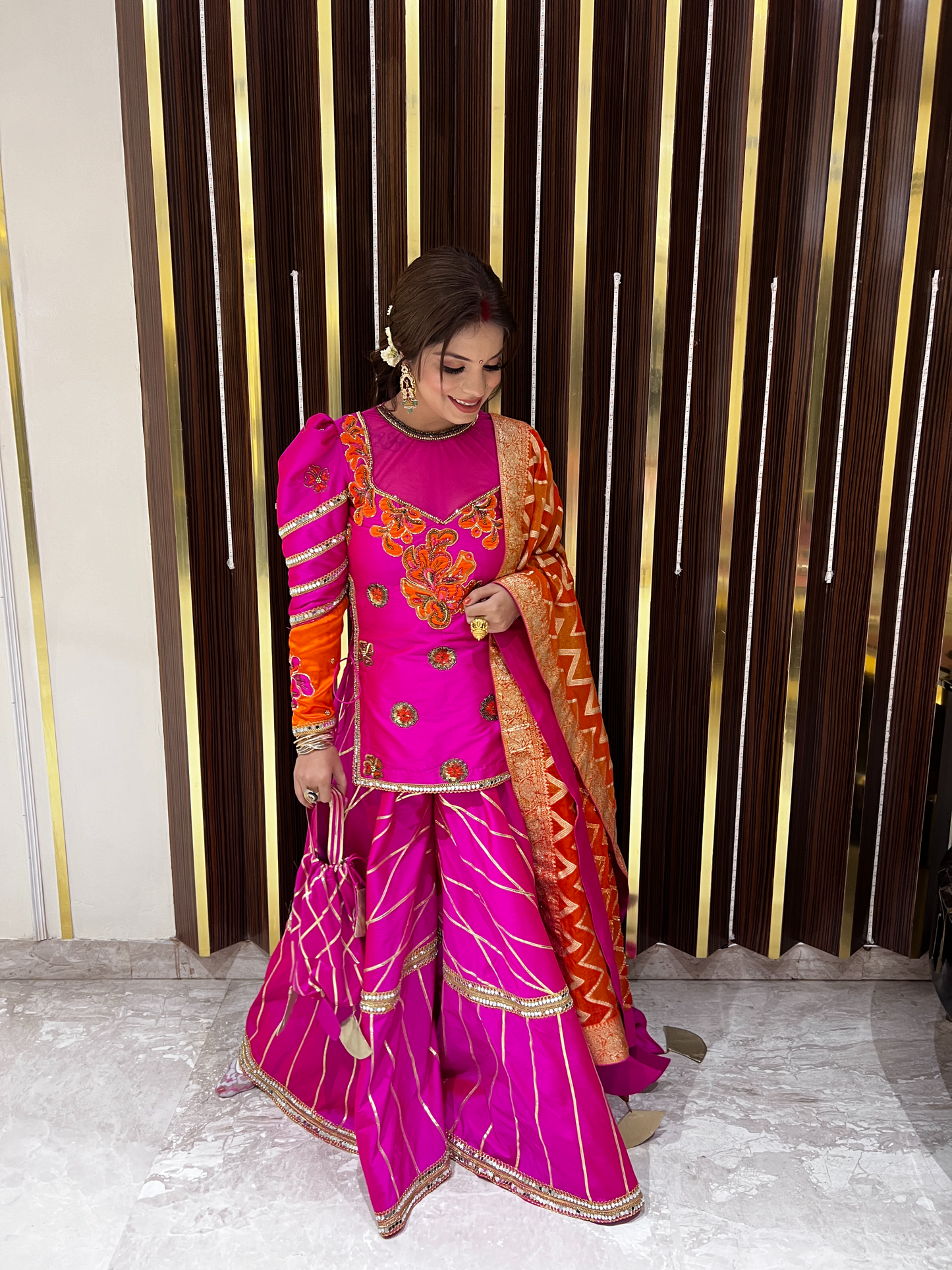 Close-up of embroidery and embellishments on bridal sharara set