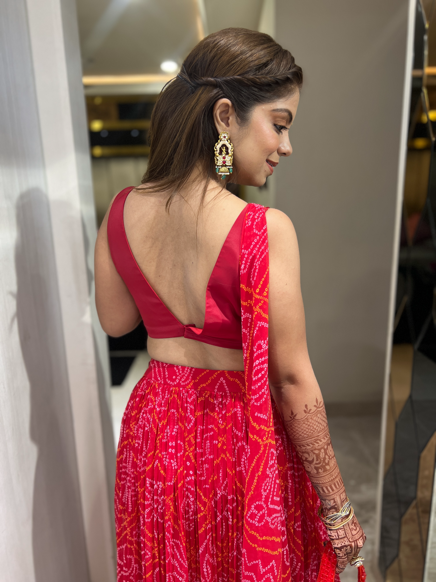 Elegant red traditional dress with intricate embroidery – perfect for weddings and festive occasions