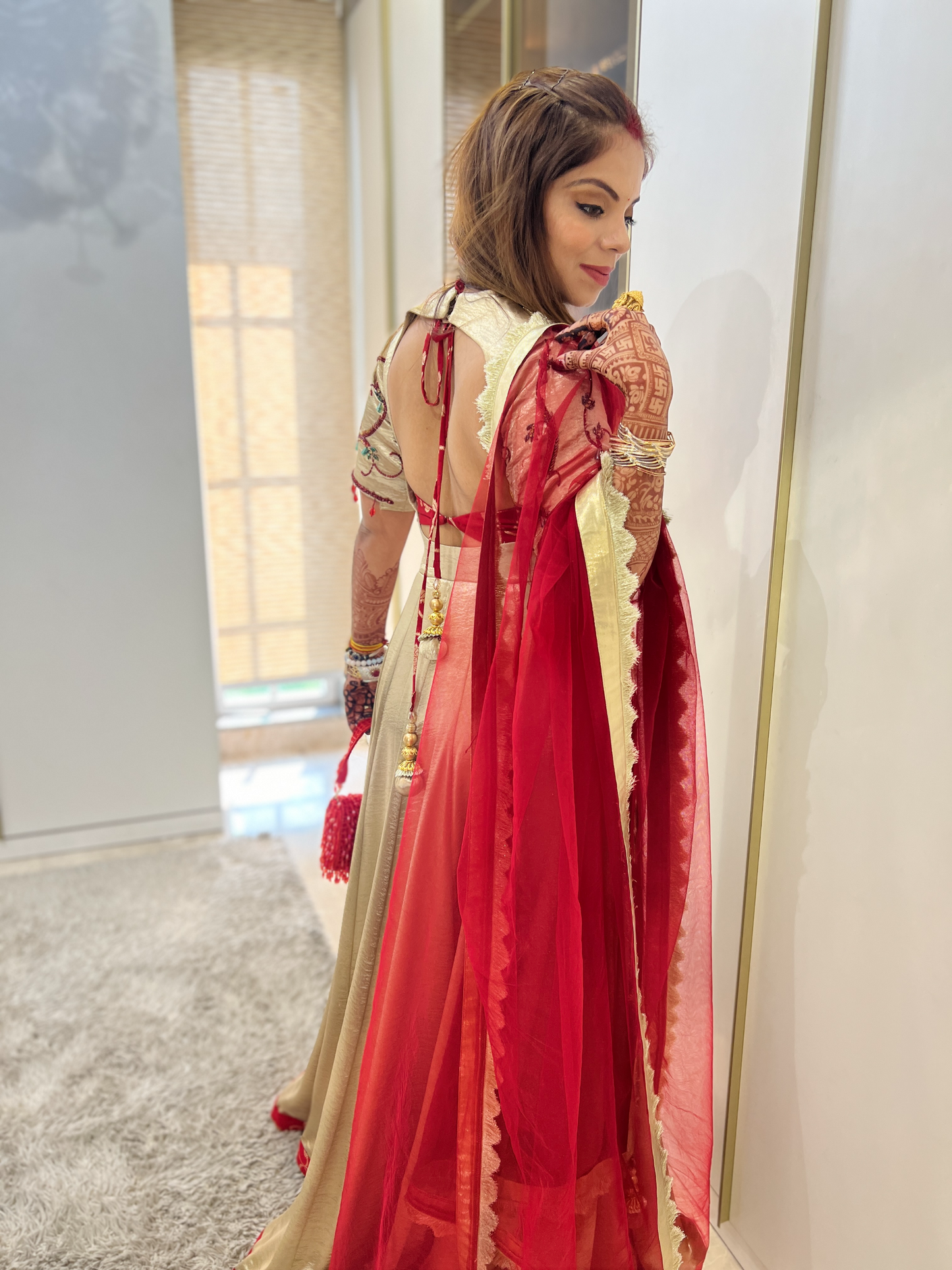 Elegant red and golden Anarkali with intricate embroidery – perfect for weddings and festive occasions