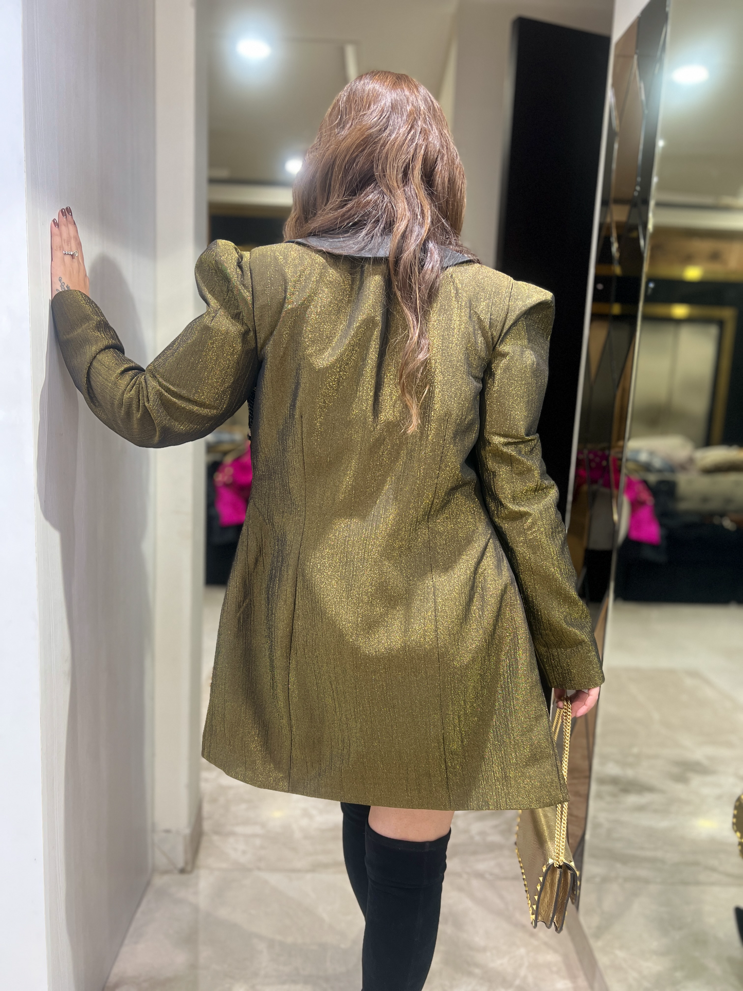 Back view of women’s long coat with metallic embroidery – formal eveningwear


