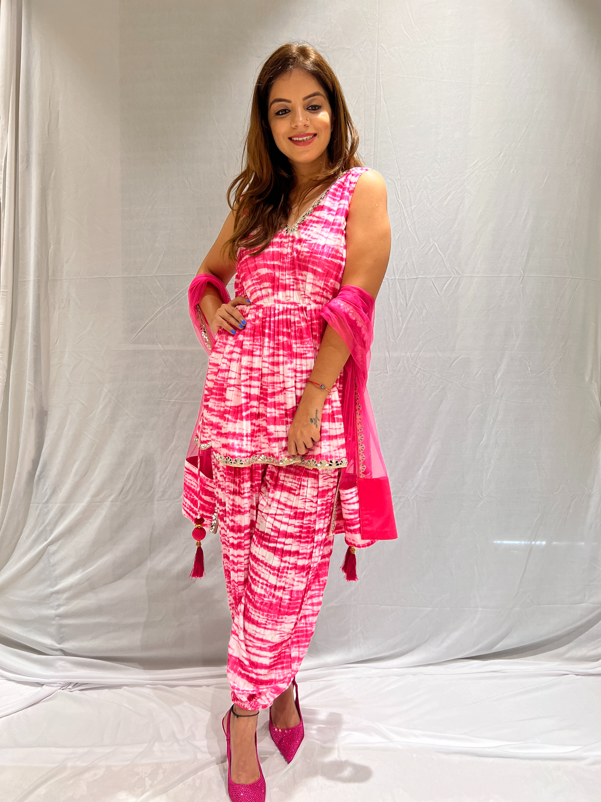 Elegant mirror lace pink and white tie-dye peplum set – modern design with intricate lace detailing for a chic, sophisticated look