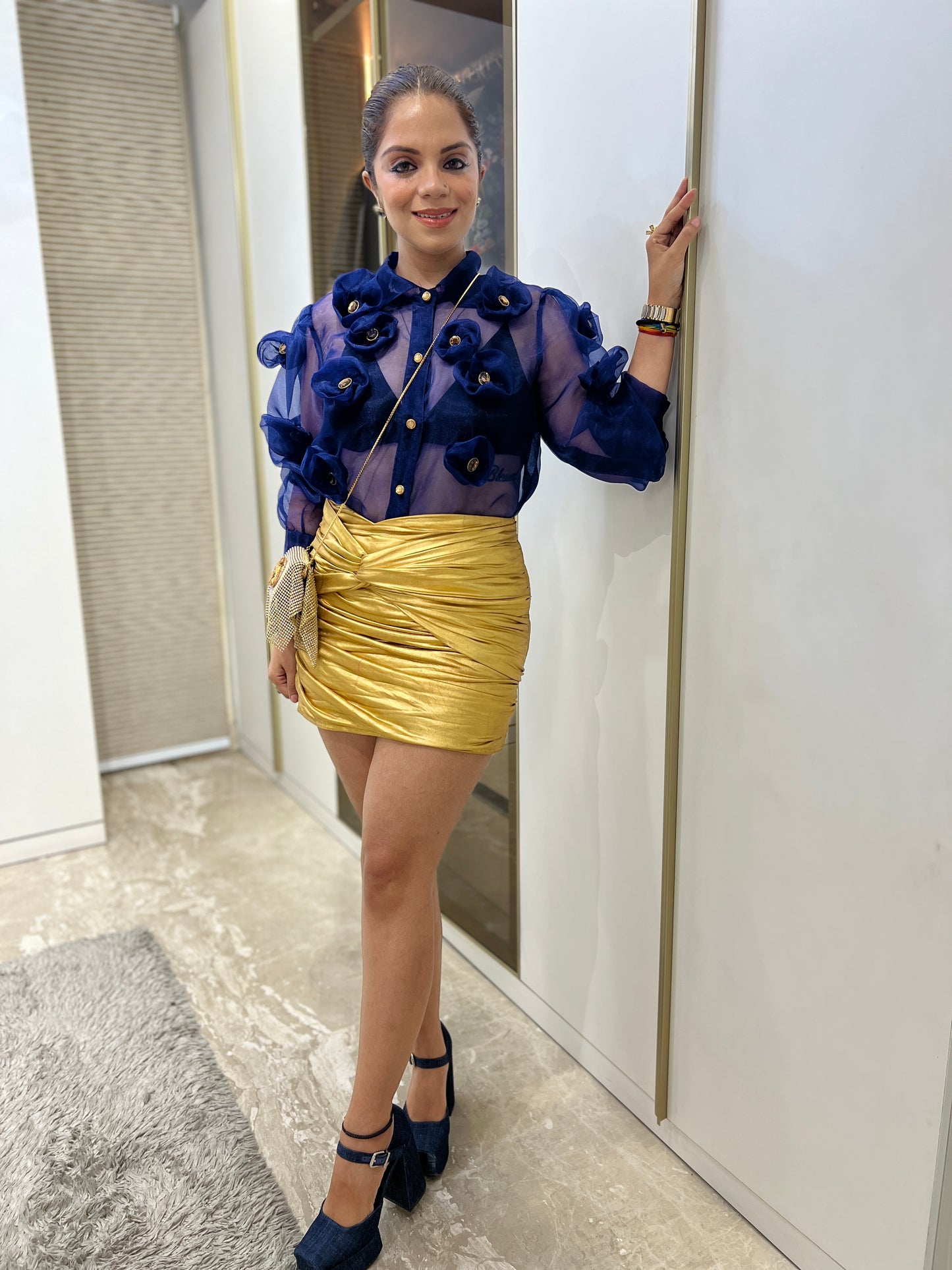 Front view of navy blue sheer organza shirt with 3D floral appliqué and gold buttons – women's partywear top